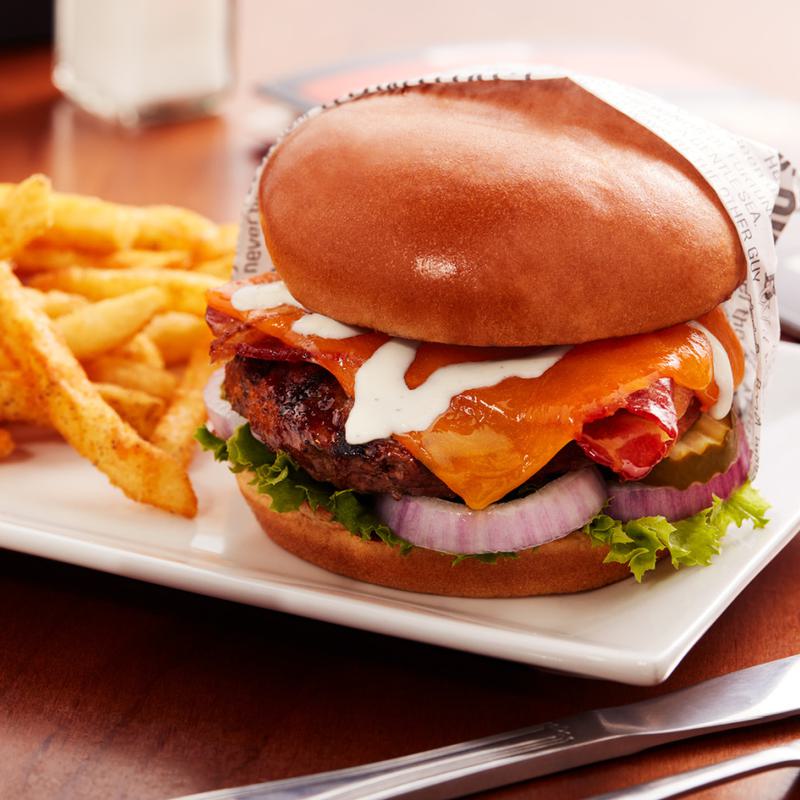 Burger and fries from Big Whiskeys American Restaurant food menu