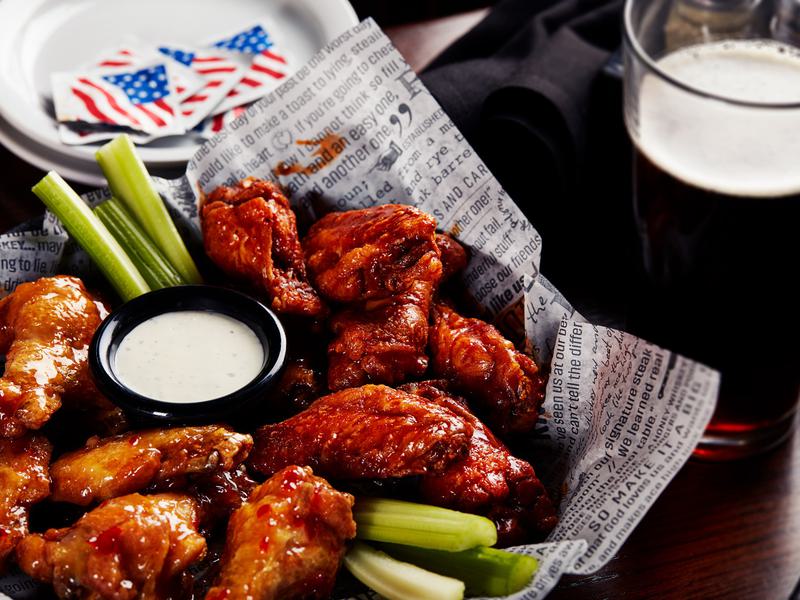 Wings from the local happy hours gameday specials Big Whiskey's American Restaurant & Bar menu.